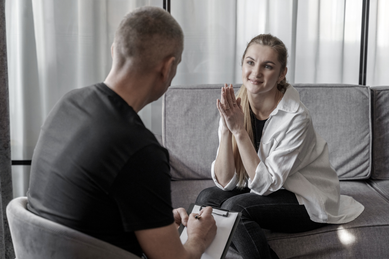 A woman getting detox placement services at Boston Addiction Treatment, a rehab center in Peabody, MA.