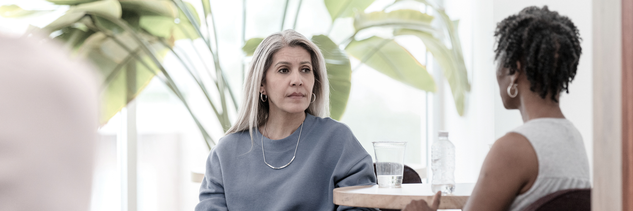A woman in outpatient cognitive-behavioral therapy (CBT) at Boston Addiction Treatment, a rehab center in Peabody, MA.