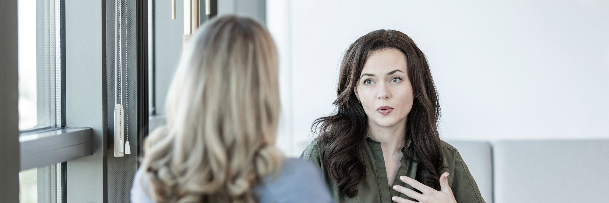 A woman getting outpatient trauma-informed therapy at Boston Addiction Treatment, a rehab center in Peabody, MA.