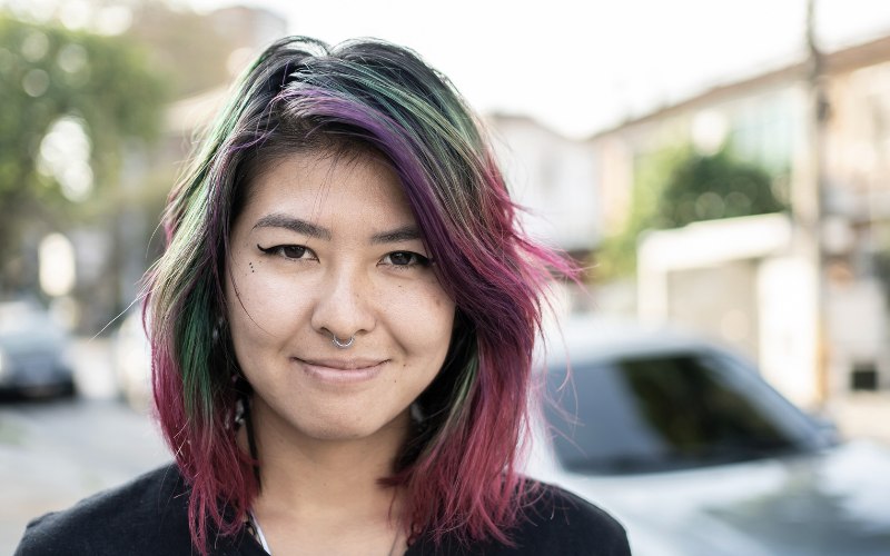 young female looking self-assured