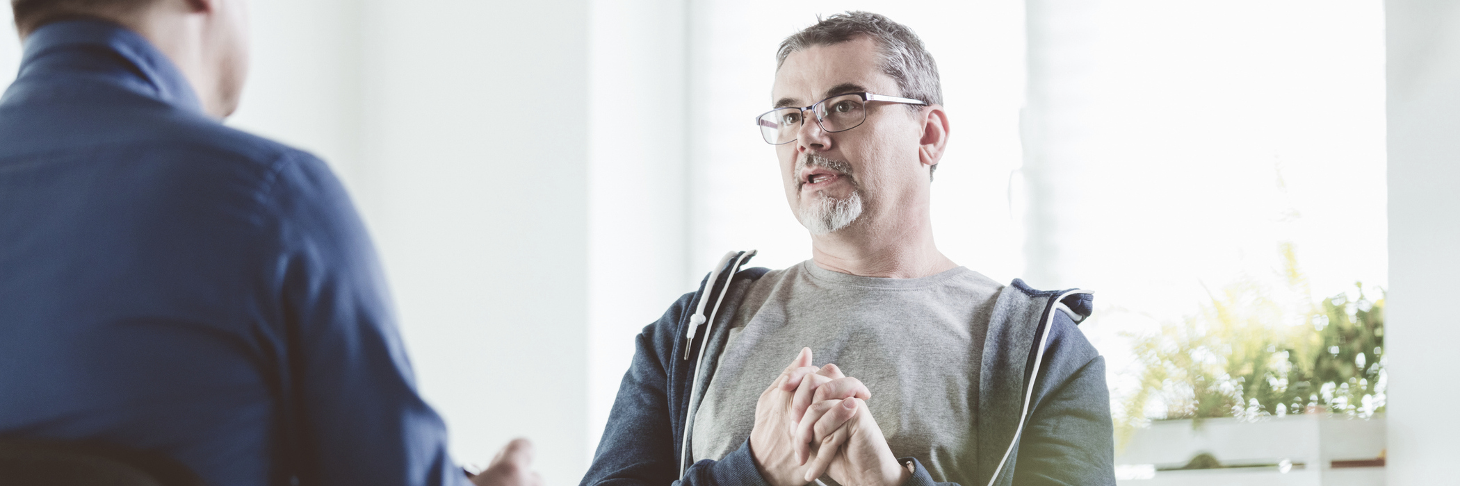 A man getting outpatient OCD treatment at Boston Addiction Treatment in Peabody, MA.