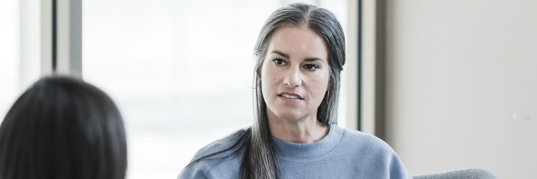 A woman getting outpatient PTSD treatment at Boston Addiction Treatment in Peabody, MA.